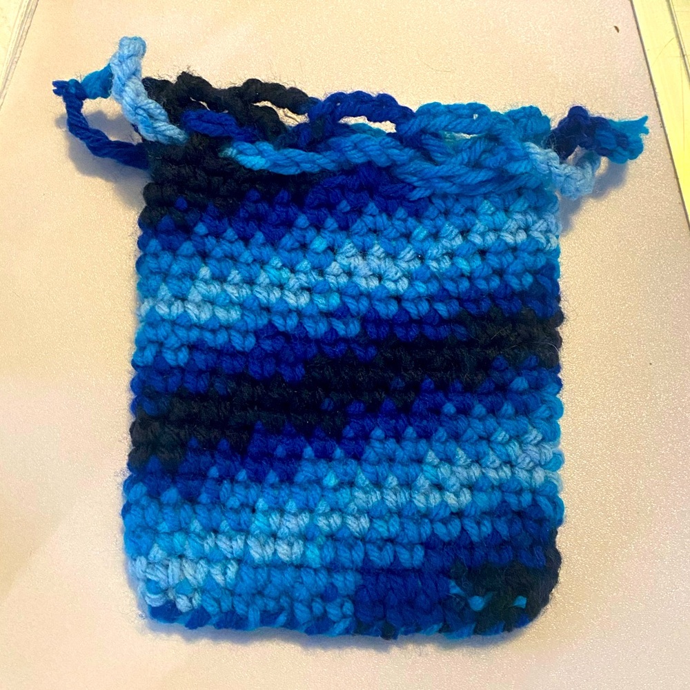 Blue crochet mini drawstring pouch